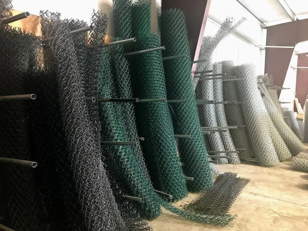 Rolled chain-link fences in storage