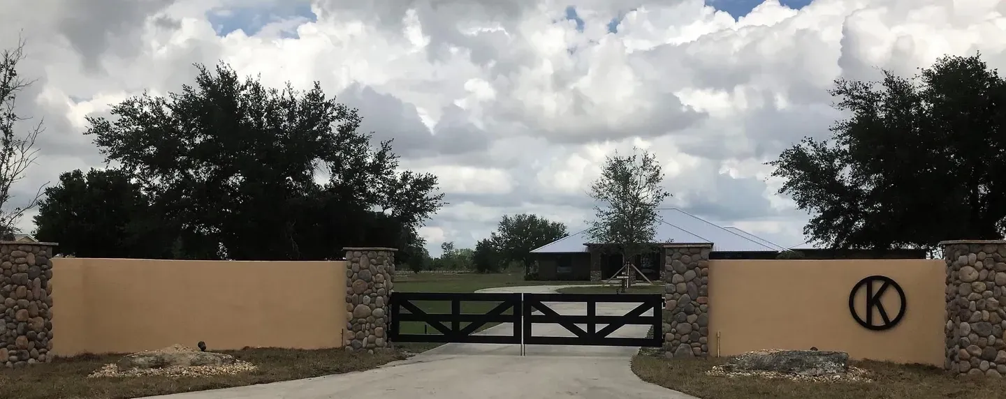 Driveway leading to gated property