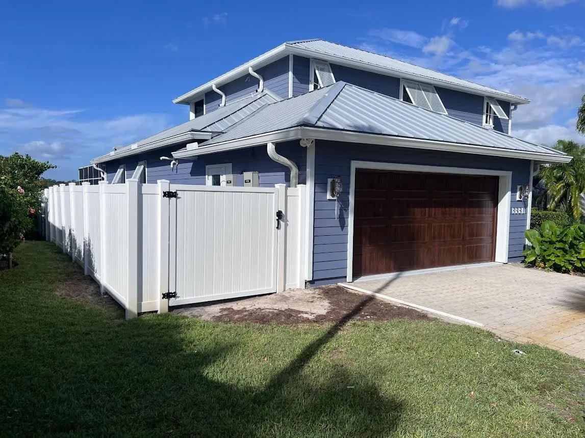 Modern home with wooden garage door